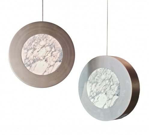 Calamina L: A sculpture made of iron and Carrara marble. The challenge of this piece is a fine and compact material to become translucent, creating an aesthetic composition between the light and the stone's vein. 